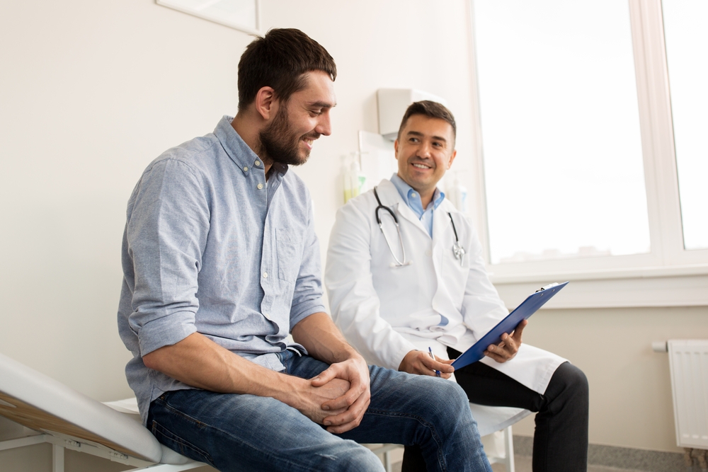 Doctor and patient discussing health